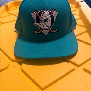 Fanatics Teal Hockey Mask Snapback Hat